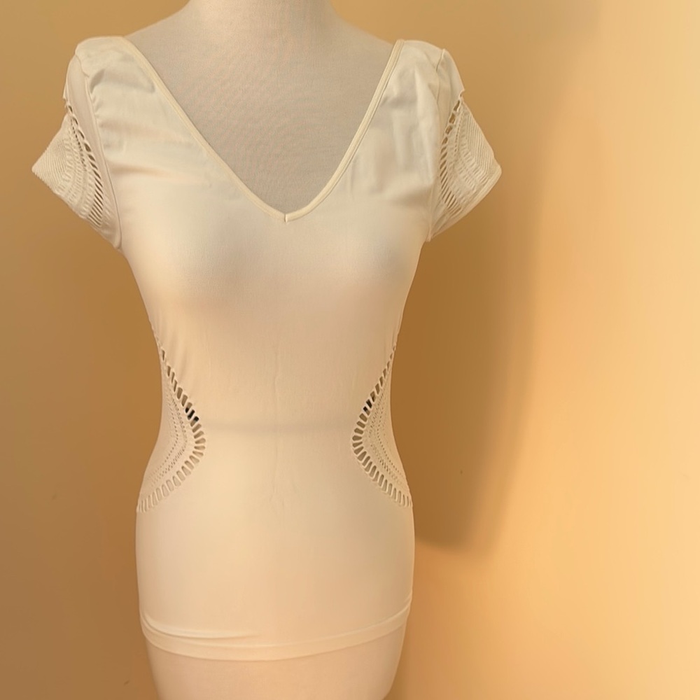 Chic Cream V-Neck Top with Cut-Out Details